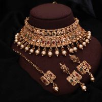 Multi Color Kundan With Pearl Gold Choker With pair Of Earring and Maang Tikka Set