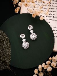 Sparkle in Style with Silver White Stud Earrings
