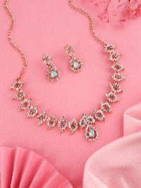 Stylish rose gold necklace set with White AD stones