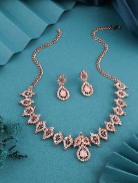 Statement rose gold jewelry set with dazzling AD stones