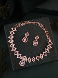 Elegant rose gold necklace set with radiant AD highlights