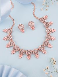 Glamorous rose gold accessory set showcasing stunning AD gemstones