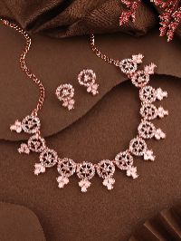 Trendy rose gold necklace set with AD stones