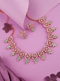 Fashionable rose gold necklace ensemble with White & Sky Blue Stone