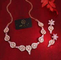 Contemporary rose gold accessory set with sparkling AD stones