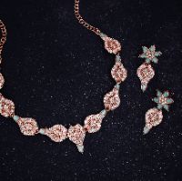 Unique rose gold necklace set with sparkling AD accents