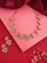 Fashionable rose gold necklace ensemble with AD