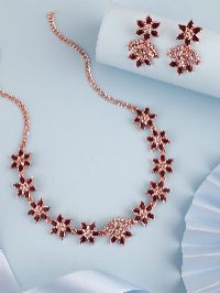 Glamorous rose gold accessory set showcasing stunning AD gemstones