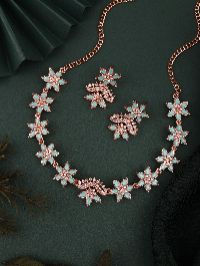 Luxurious rose gold jewelry ensemble with AD embellishments