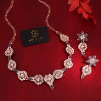 Chic choker jewelry set adorned with sparkling white AD stones