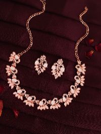 Rose Gold - Plated Zircons Studded Patterned Party Wear Jewellery Set