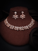 Alluring Bloom: Rose Gold Plated Statement Necklace Set with Delicate AD