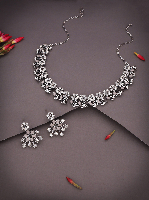 Silver Oxidised Necklace With Floral Design And AD Studded