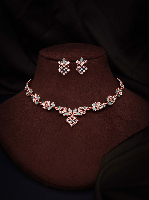 Glamorous rose gold accessory set showcasing stunning AD gemstones