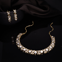 Gold Plated White Stone Studded American Diamond Necklace Set.