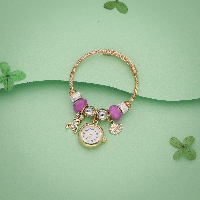 Gold Tone Bracelet Watch with Unique Charms – Elegant Timepiece