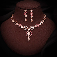 Artisan-Crafted Rose Gold AD Diamond Necklace Set Featuring Elaborate Leaf Designs and Coordinating Earrings