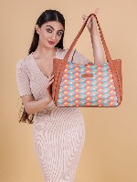 Elegant Day-to-Night Designer Bag Featuring Smooth Textured Leather, Polished Chains, and Inner Zip Compartment