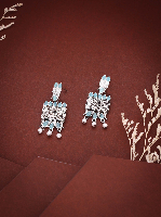 Bohemian Style Silver Etched Earrings with Aqua Accents and Dangling White Beads Bohemian Style Silver Etched Earrings with Aqua Accents and Dangling White Beads