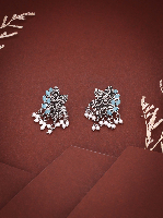 Artisan Crafted Silver Statement Earrings with Engraved Flower, Teal Embellishments, and Faux Pearl Drops Artisan Crafted Silver Statement Earrings with Engraved Flower, Teal Embellishments, and Faux Pearl Drops