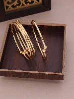 Simple Gold-Toned Multi-Strand Bangle Set with Bead Accents Simple Gold-Toned Multi-Strand Bangle Set with Bead Accents