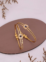 Elegant Gold-Plated Kada Bangles with Sapphire Blue Stone & Textured Accents Elegant Gold-Plated Kada Bangles with Sapphire Blue Stone & Textured Accents