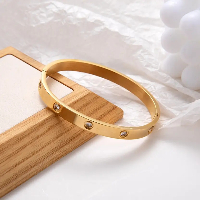 Dazzling American Diamond Studded Gold Plated Kada - Modern & Elegant Dazzling American Diamond Studded Gold Plated Kada - Modern & Elegant